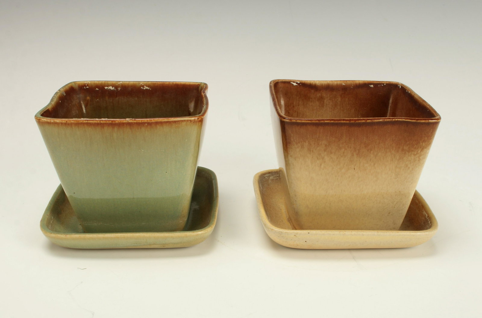 2 STANLEY BALLARD VERMONT PLANTERS: Yellow and green planters with brown rims, and attached bottom tray, marked "32 S Ballard Vermont 61" on the bottom of each. 5" X 4" $20 - $40 Please contact us for high reso