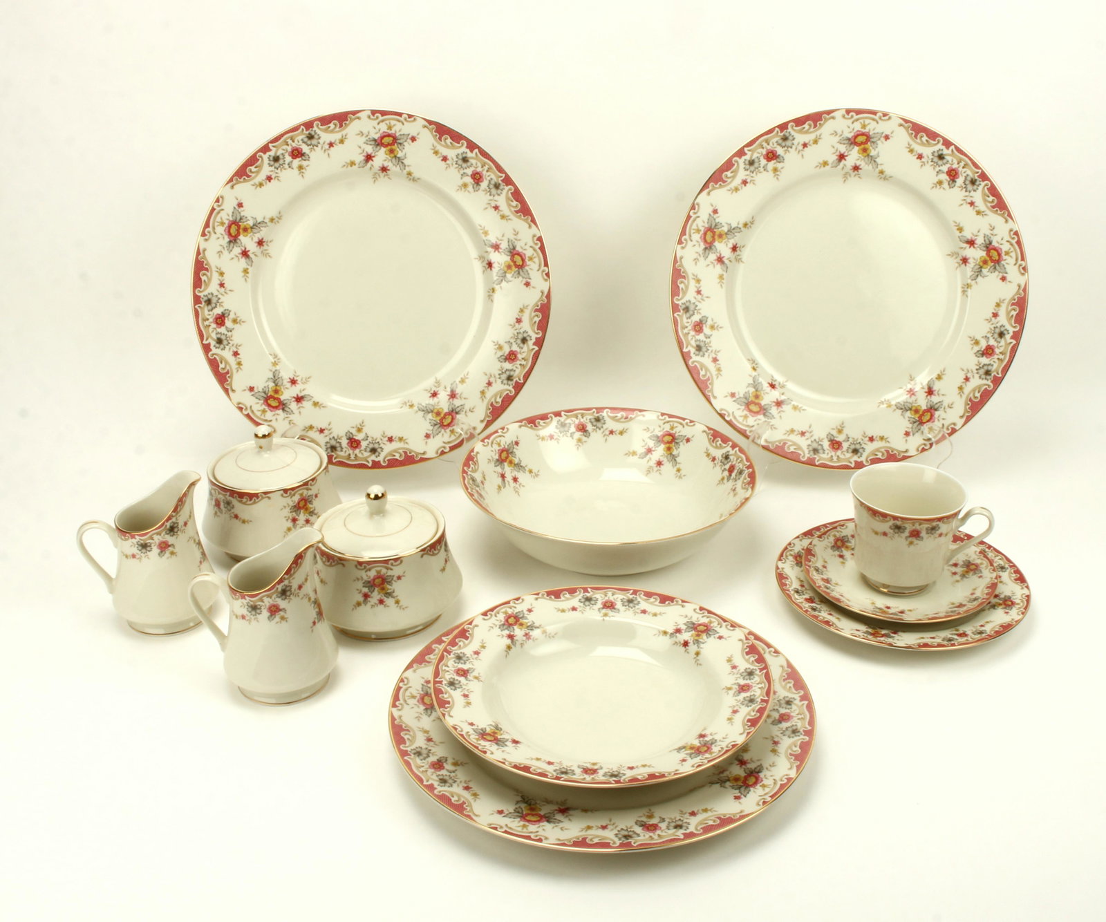 LARGE SERVICE OF MIKASA SHELLY: Service for 16. 16 dinner plates, 18 bowls, 16 salad (one chipped), 16 saucers, 14 cups (one cracked), 2 round platters, 2 sets sugar and creamer, 1 open serving bowl. 1 1/4" $20 - $40 Ple