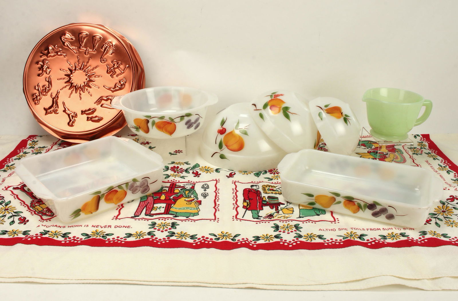 FIRE KING GAY FAD BOWLS AND PANS, JADEITE 2 CUP: Painted with brightly colored fruit, this Fire King classic will enliven your kitchen! Set of 3 nesting bowls, 1 square pan and 1 rectangular pan. Lot includes Jadeite 2C measuring cup with spout, Vin