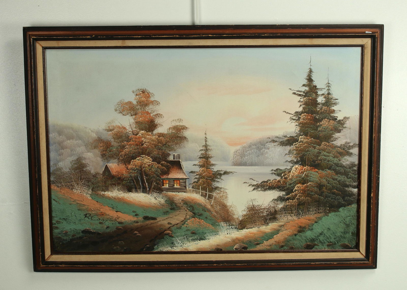 SIGNED ORIGINAL AUTUMNAL LANDSCAPE PAINTING: Large landscape painted in the style of Bob Ross. Painted on canvas. Shows a log cabin in the woods overlooking a lake. 28 3/4" x 40 1/2" $40 - $80 Please contact us for high resolutio