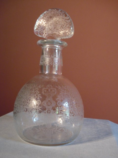 Etched Glass Perfume Bottle: A late Victorian or Edwardian 7" etched glass perfume bottle.