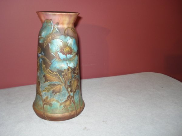 Royal Bonn, German art glass vase: A fine German art glass ceramic vase, 8 1/2" in height, decorated in polychrome glazes with flowers. The bottom is stamped "Royal Bonn" and "Musterschutz".