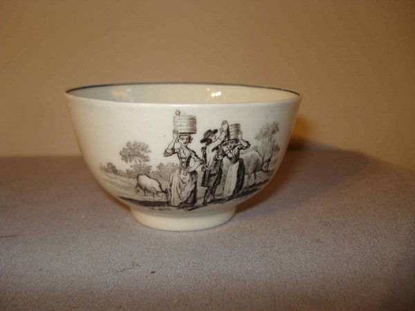 Assortment of Chinese Ceramics: An assortment of Chinese ceramics, including a peacock decorated vase, a small 3" tea cup with three transfer scenes, 5 1/2" scent bottle, and a blue and white bowl.