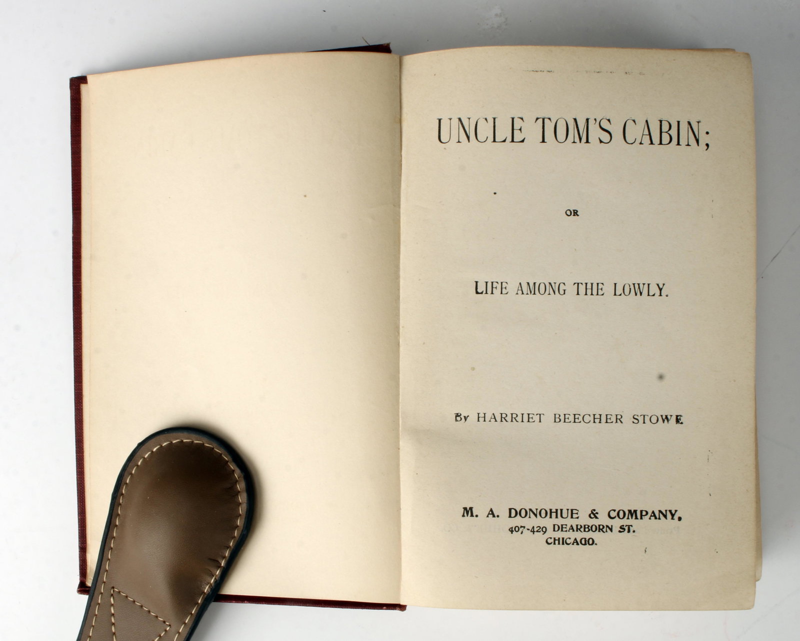 UNCLE TOM'S CABIN: Uncle Tom's Cabin or Life Among the Lowly by Harriet Beecher Stowe. Printed and bound by M.A. Donohue & Co. Red cloth binding, hardcover. 5 1/4" X 7 1/2" $20 - $40 Please contact