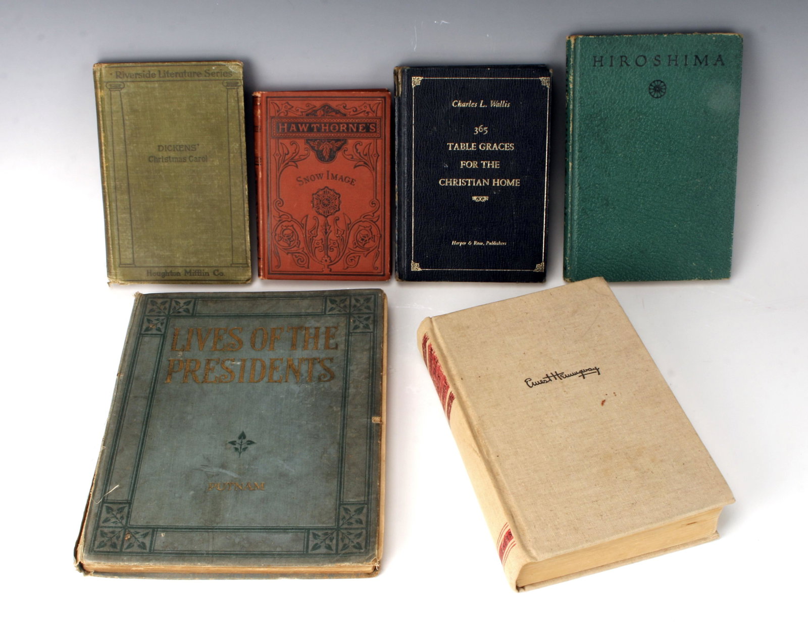 HEMINGWAY, DICKENS, HAWTHORNE, PUTNAM LOT: For Whom the Bell Tolls - by Ernest Hemingway, Published by Charles Scribner's Sons, New York, hardcover, cloth binding, copyright 1940, no dust jacket. A Christmas Carol in Prose: Being a Ghost