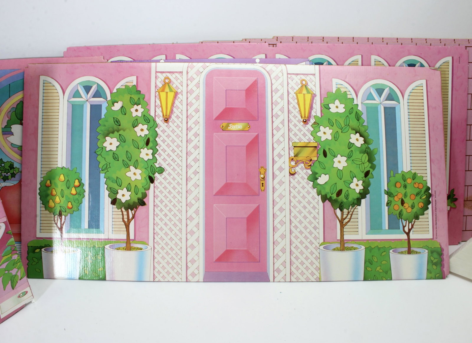 BARBIE DREAM HOUSE AND FURNITURE: Structure for the Dream House with cardboard backgrounds, fence, bed, convertible couches, and bathroom set. $40 - $80 Please contact us for high resolution images of this lot. Shipping: We