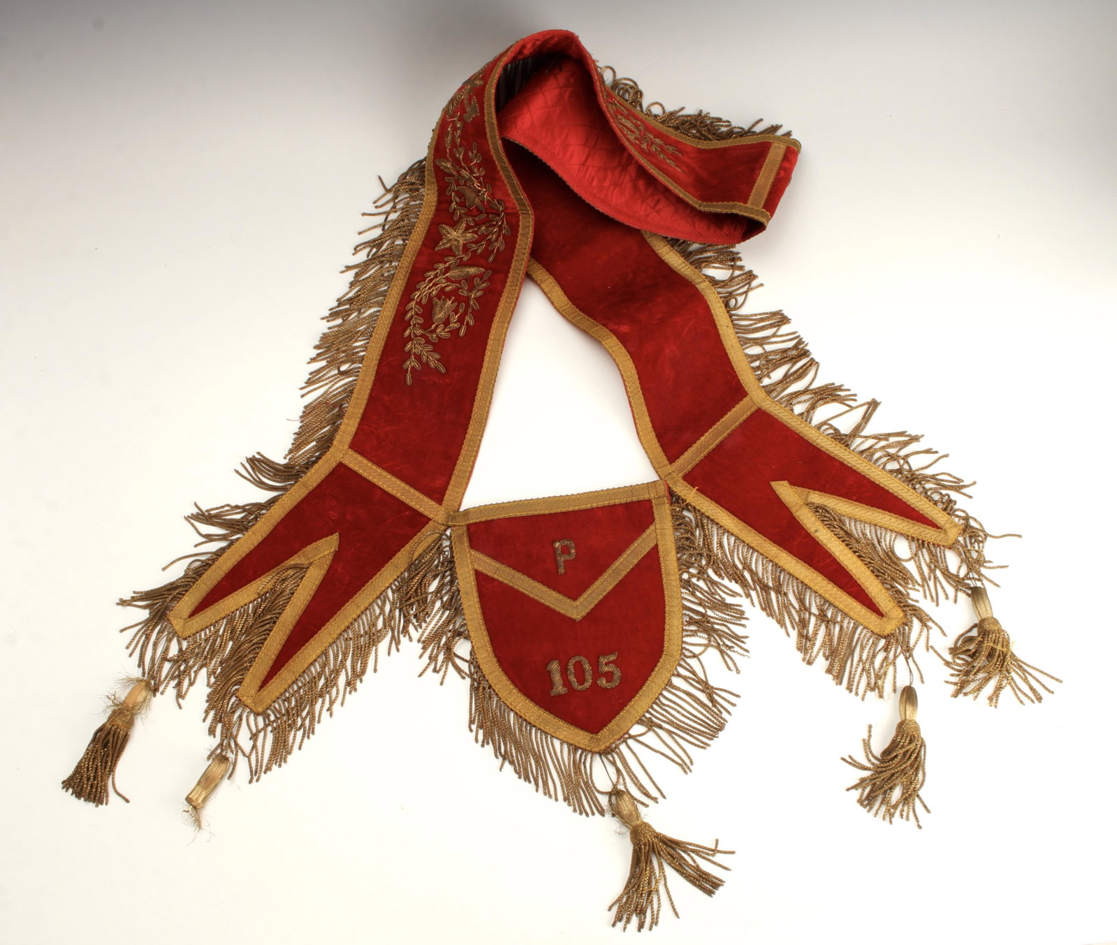 EARLY ODD FELLOWS CEREMONIAL SASH: Harding Uniform and Regalia Company Boston. Red velvet with gold ribbon and metallic embroidery. Red quilted lining. $40 - $80 Please contact us for high resolution images of this lot. Shipping: