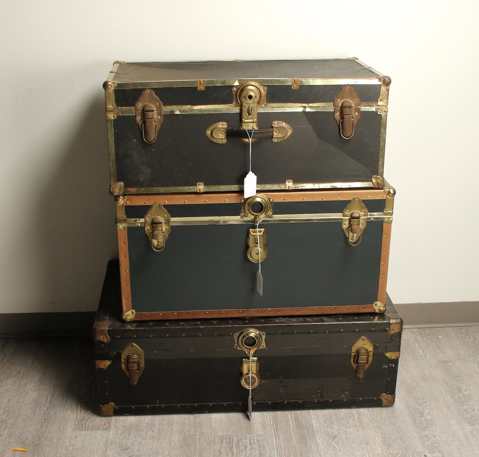 3 VINTAGE STEAMER TRUNKS: The blue trunk has top tray. Two larger trunks have side handles. 36" X 12" X 20" $20 - $40 Please contact us for high resolution images of this lot. Shipping: