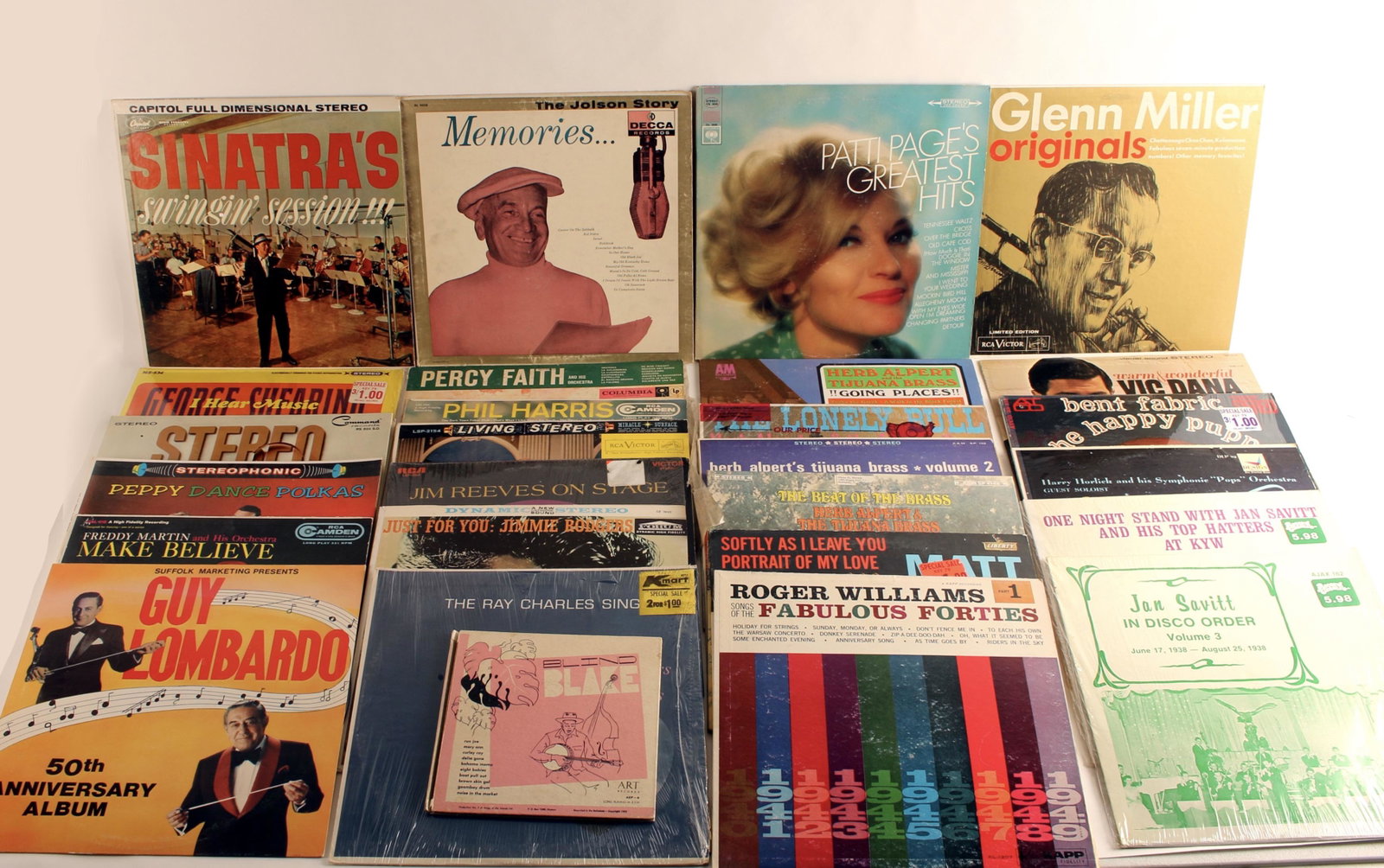 32 ASSORTED CLASSICS VINYL ALBUMS: 32 Albums. Includes 45's. Patti Page. Herb Alpert. Jan Sabitt. Ray Charles. Frank Sinatra. Great lot for all moods. $100 - $200 Please contact us for high resolution images of this lot. Shipping: