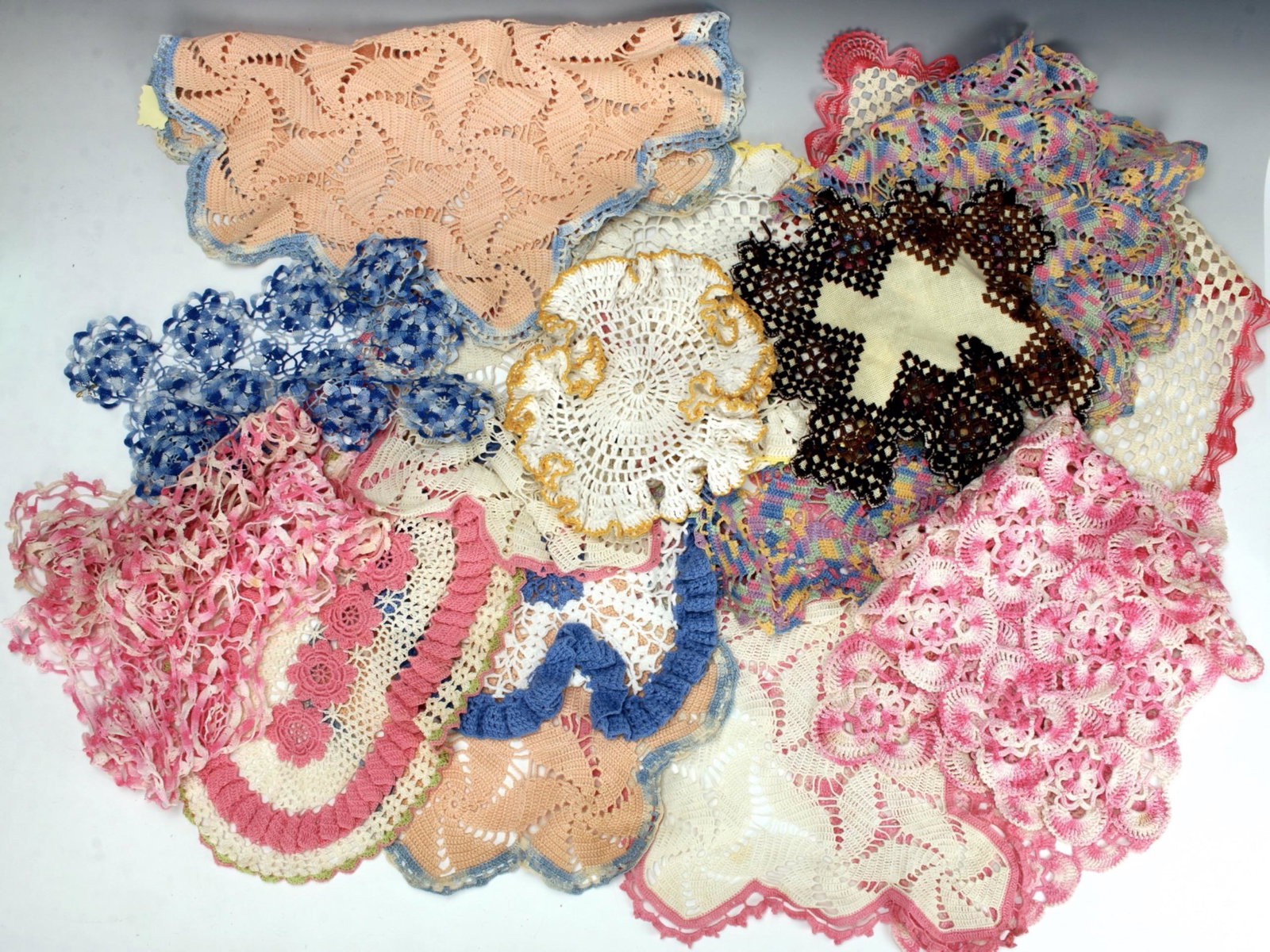 LOT OF VINTAGE DOILIES: Large lot of assorted colorful handmade doilies. Be Inspired by mixed media artist Nick Cave (see last photo) and create your own fabulous artwork! Nick Cave sculpture not included! $20 - $40 Please c