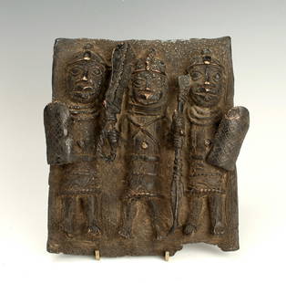 BENIN CAST BRONZE PLAQUE OF SOLDIERS: Benin Cast Bronze Plaque of Soldiers Three warriors carrying spears and shields, and wearing helmets. 7" X 8" $100 - $200 Shipping: We are able to pack and ship this item to an address in