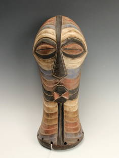 SONGYE SONGUE MASK CONGO: Songye Songue Mask CongoIncised with curved lines with slits for eyes and elongated triangular no