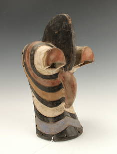 SONGYE SONGUE KIFWEBE BIRD MASK: Songye Songue Kifwebe Bird MaskBeak, tall black crest, prominent eye area. Painted in stripes of