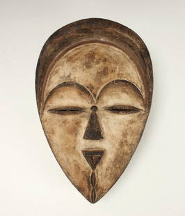 MITSOGO MASK GABON: Mitsogo Mask GabonTriangular nose and mouth, pronounced arched brows in the center to form a heart shape. 13 1/2" X 9" $100 - $200 Shipping: We are able to pack and ship this item to an