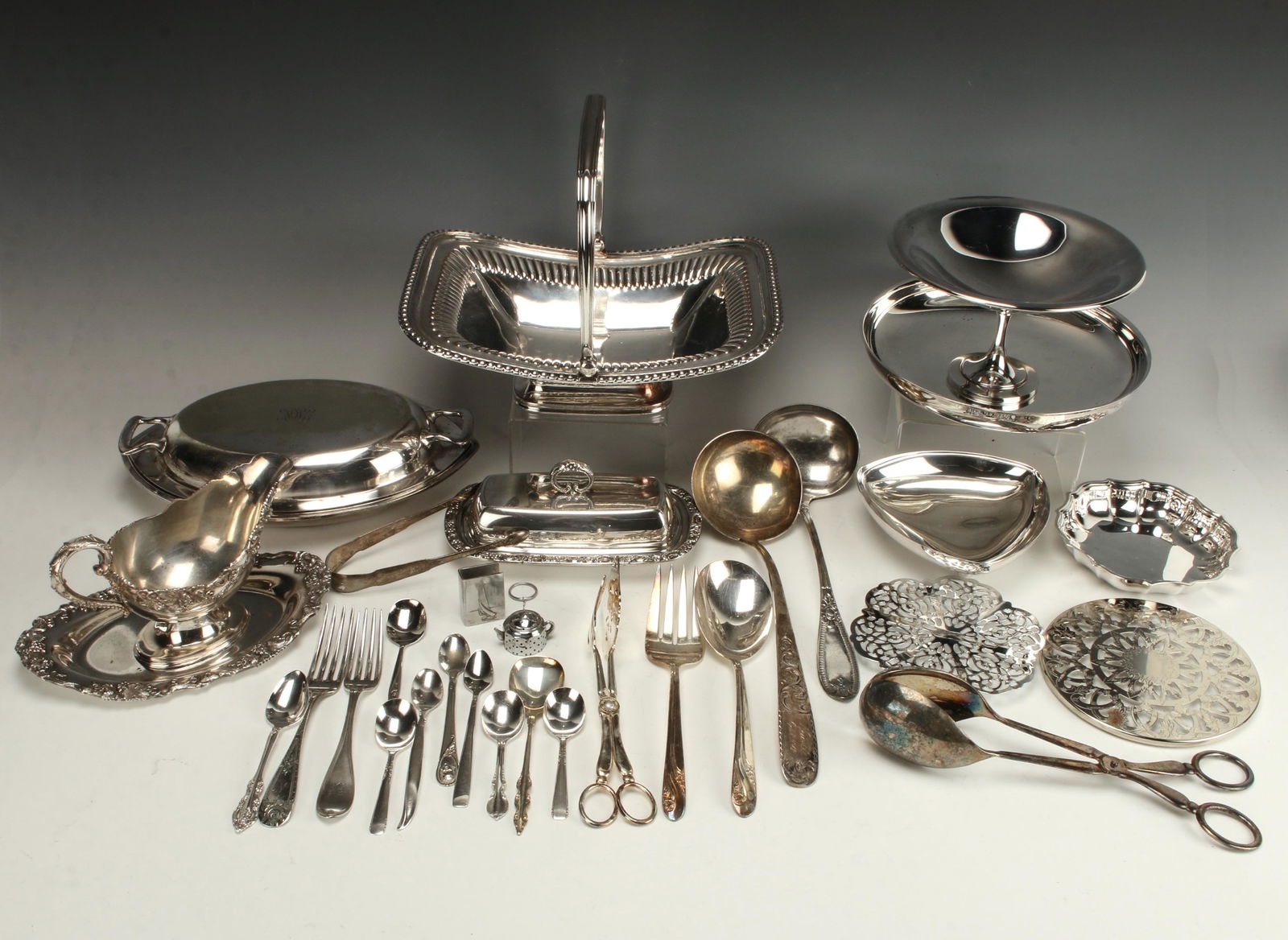 LOT OF SILVERPLATE SERVING PIECES (1 of 1)