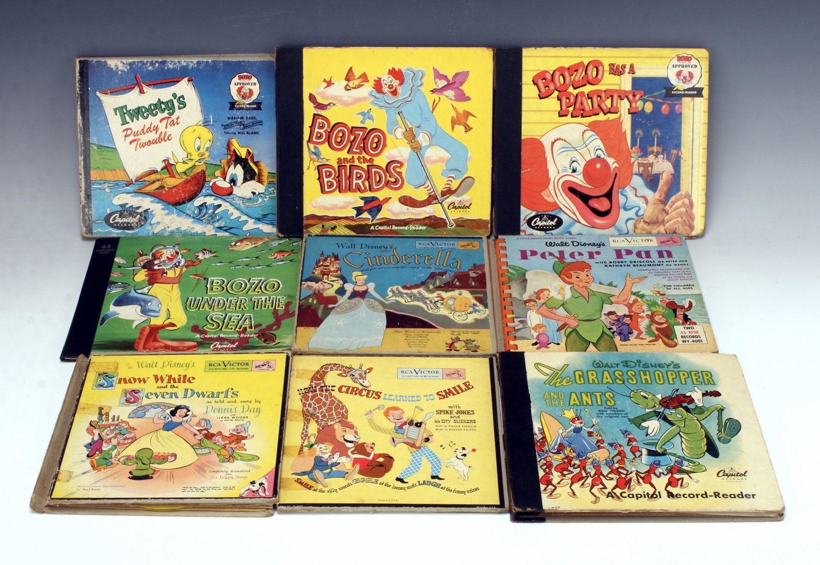 COLLECTION OF CHILDREN'S STORY BOOK 45 RECORDS: COLLECTION OF CHILDREN'S STORY BOOK 45 RECORDSNine albums, all have their records. Walt Disney's Peter Pan, Cinderella, The Grasshopper and the Ants, Snow White and the Seven Dwarves. Bozo