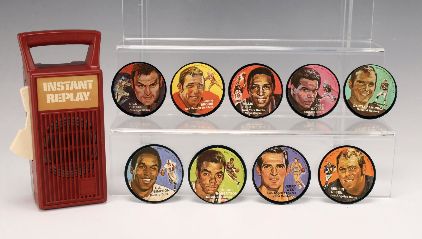 9 MATTEL INSTANT REPLAY NFL NBA DISCS: 9 MATTEL INSTANT REPLAY NFL NBA DISCSIncluding Daryle Lamonica, Gale Sayers, Willis Reed, John Brodie, Merlin Olsen, Jerry West, Oscar Robertson, O.J. Simpson, and Dick Butkus. All marked 1