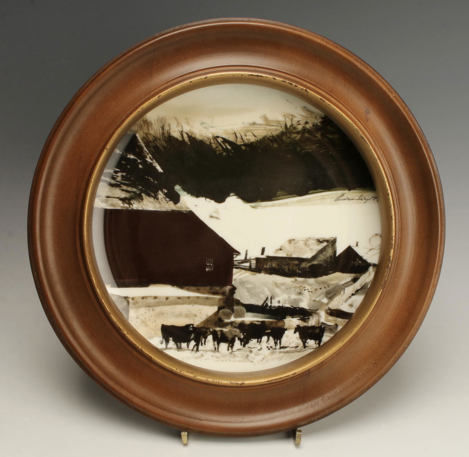 ANDREW WYETH DECORATIVE PLATE: ANDREW WYETH DECORATIVE PLATEPainting of winter barnyard scene on plate reproduced on porcelain by Georg Jensen. Marked "Copyright 1971" on back of plate. Includes display frame.
