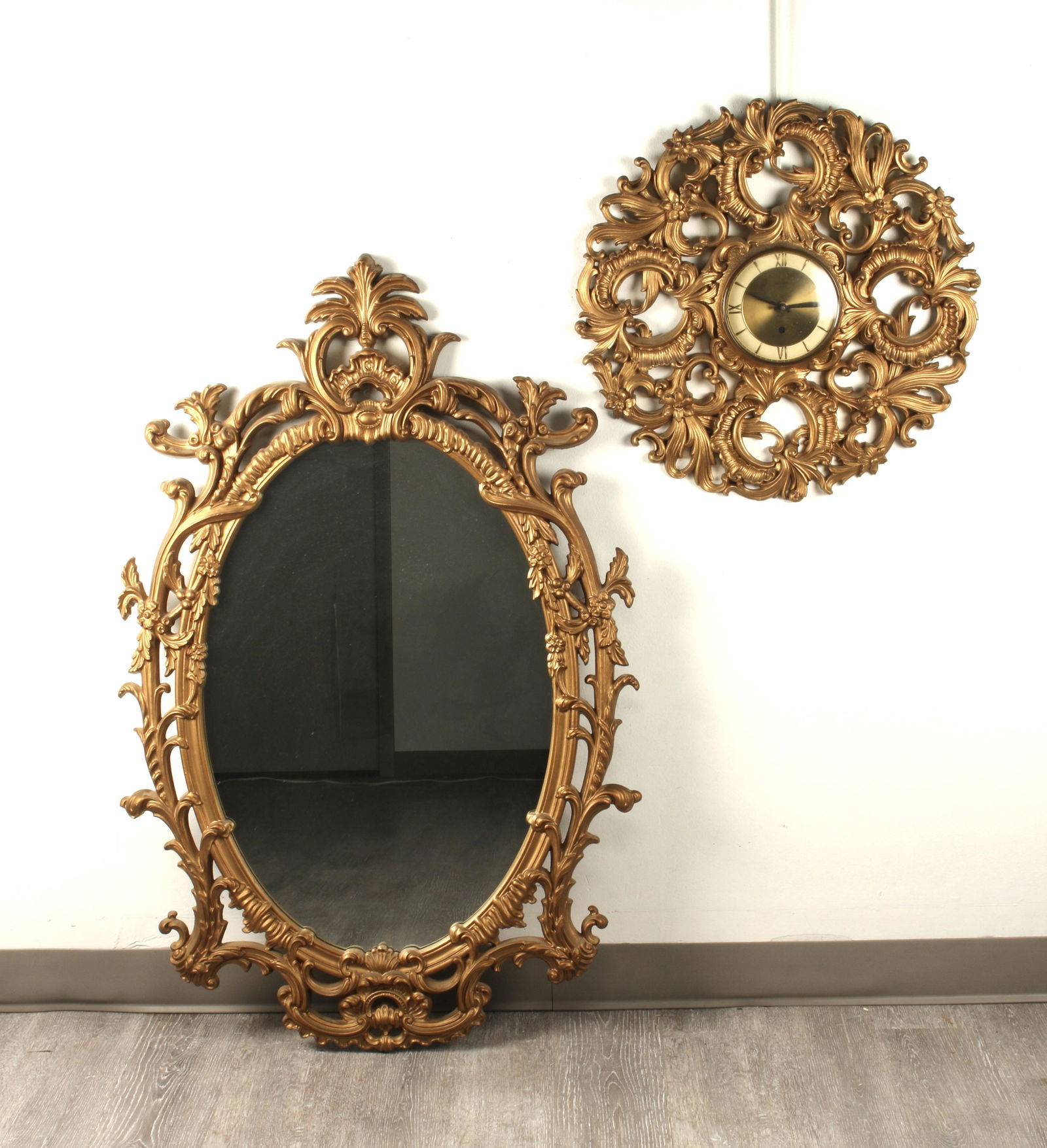 MCM MIRROR AND WALL CLOCK: MCM MIRROR AND WALL CLOCK Gold painted elaborate frames on both. 45" X 29 1/2" $100 - $200 Shippin