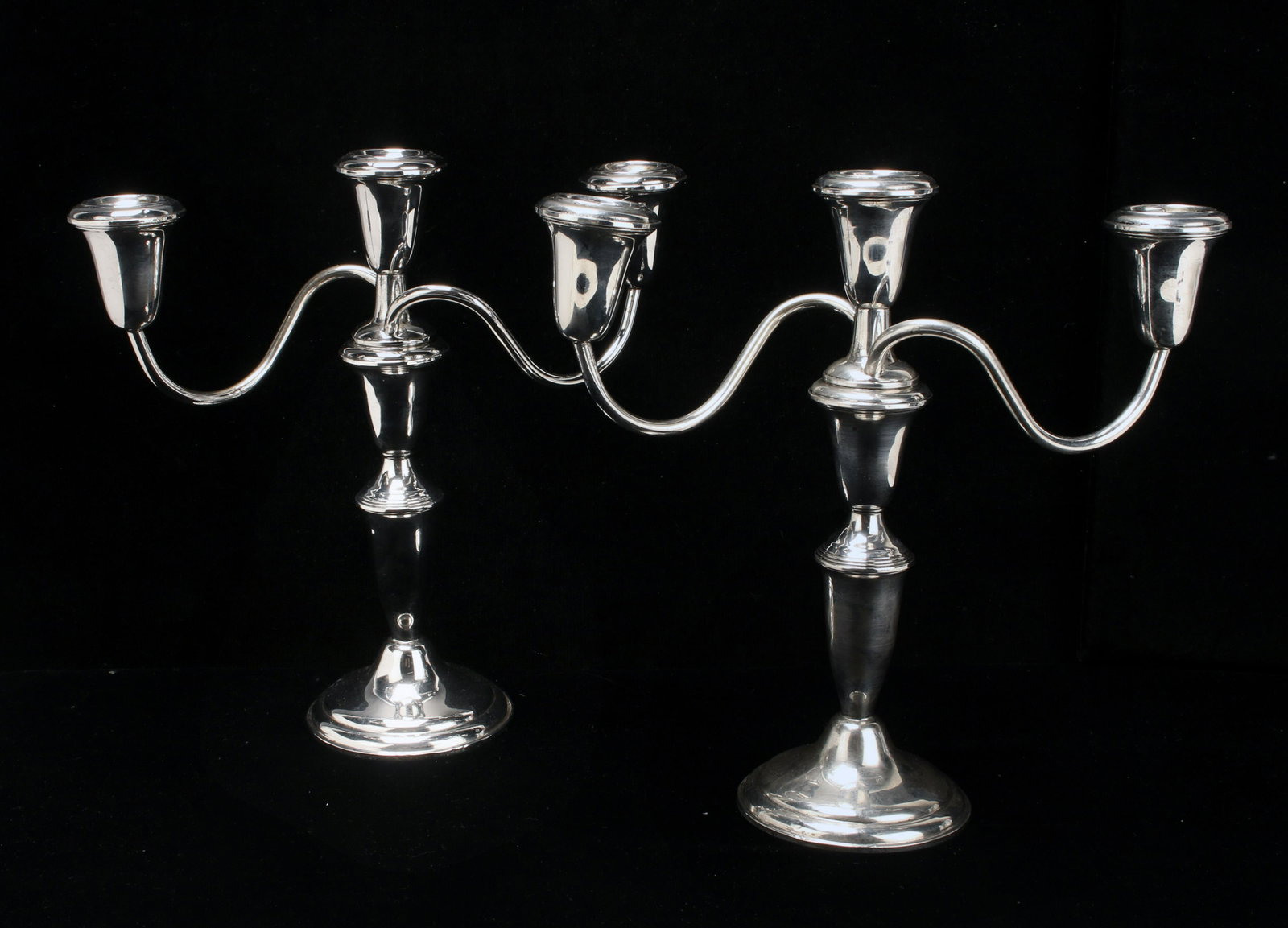 BAILEY BANKS STERLING CONVERTIBLE CANDLESTICKS: BAILEY BANKS STERLING CONVERTIBLE CANDLESTICKS Bailey Banks & Biddle sterling weighted candelabra that convert from single candleholders to three candles each.