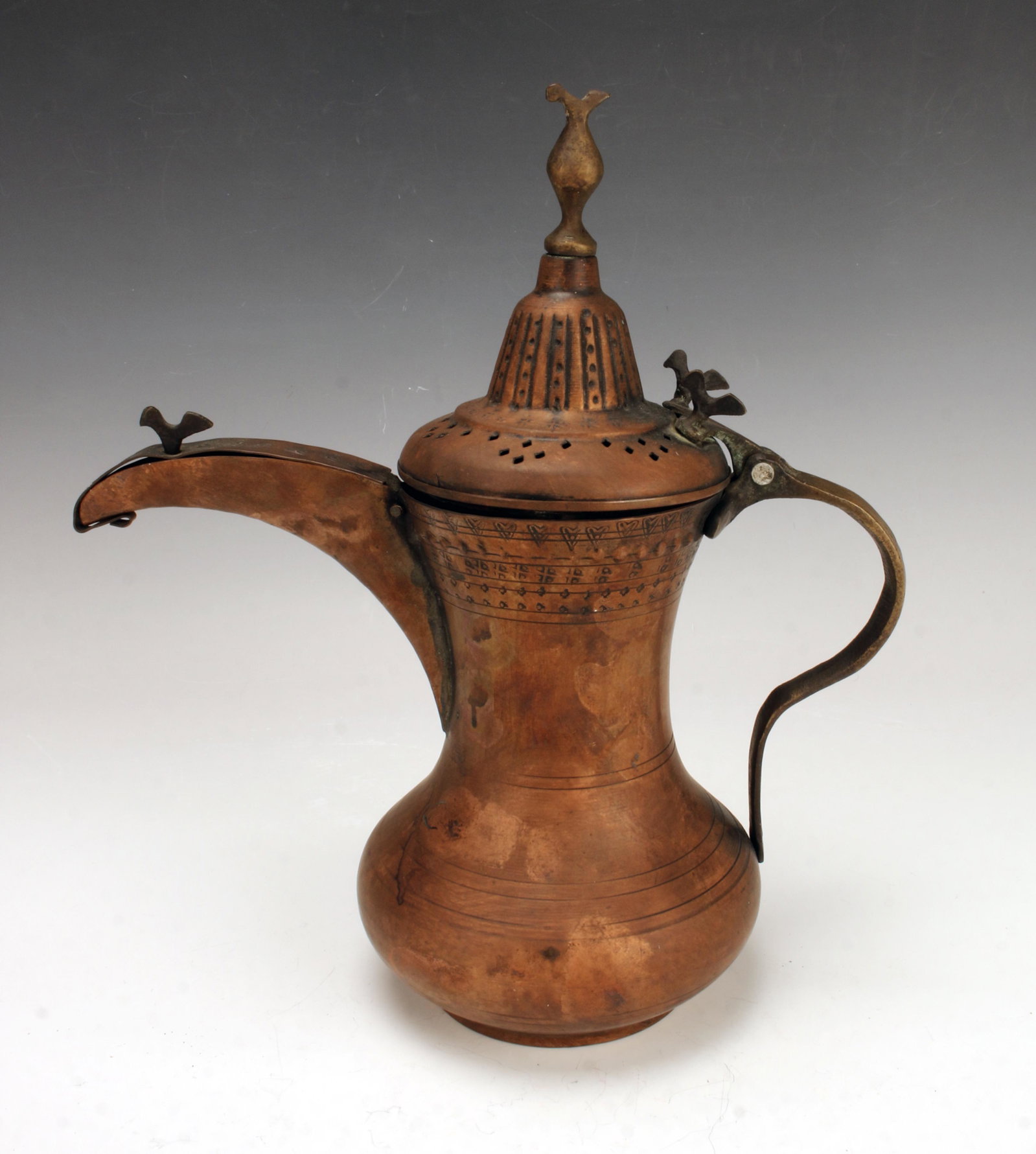 MIDDLE EASTERN DALLAH ROOSTER COFFEE POT: MIDDLE EASTERN DALLAH ROOSTER COFFEE POT Roosters on finial, spout, and top of handle. Pierced lid. Decorative borders on body. 12 3/4" x 11" x 5