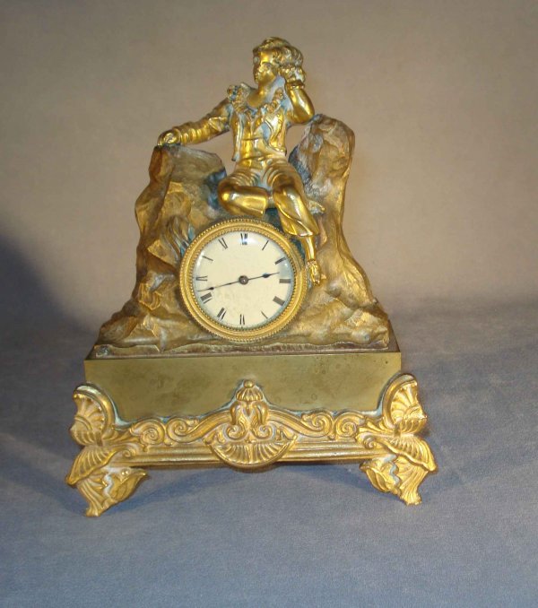 French Desk Clock : A 7 1/2" tall 19th Century cast bronze dore desk clock mounted with a key wind pocket watch.