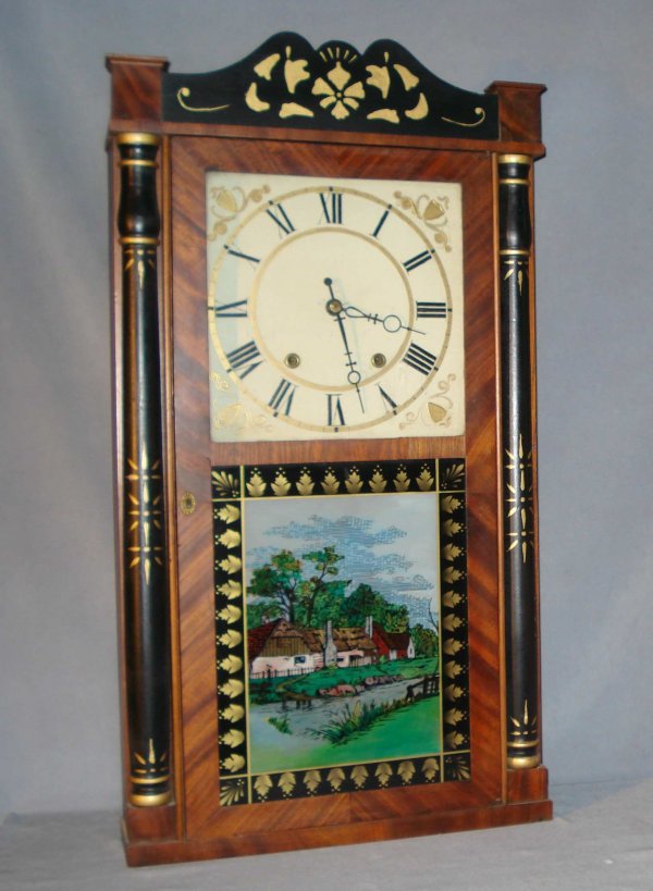 Shelf Clock by Henry Terry: A weight driven wooden geared shelf clock with a label identifying the maker as Henry Terry with a case in the half columns and splat style. Restorations.