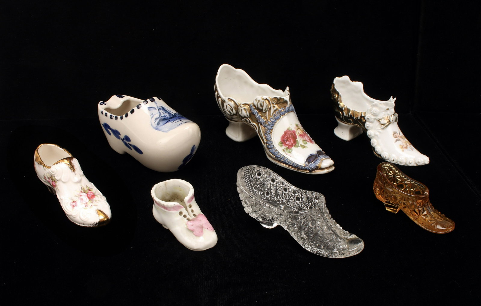 LOT OF VINTAGE GLASS & PORCELAIN SHOES DELFT: LOT OF VINTAGE GLASS & PORCELAIN SHOES DELFT Hand painted blue & white Delft clog ashtray. Paragon Victoria Rose bone China hand painted floral shoe. Cut glass heeled slipper wit