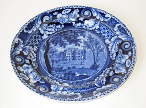 Historic Blue Staffordshire: 8 3/4" medium dark blue by Riley items "Kings Weston Gloucestershire" in the large scroll and border series.