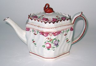 Pearlware Teapot: In a 6" octagonal shape with hand painted overglaze polychrome decoration, swan form finial, swirled fluting and sawtooth rim, c 1800.