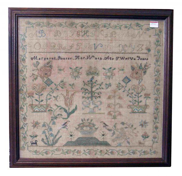 Cross Stitch Sampler by Margaret Rorer: Signed "Margaret Rorer her work at twelve years". According to our research on what is believed to be a Bucks County, Pennsylvania sampler, a Margaret Rorer (1785-1816) married George Unruh in 1803 an