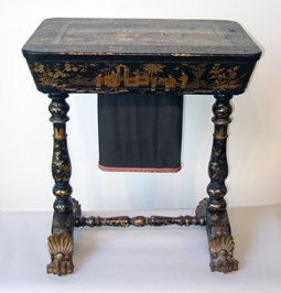 Sewing Table: A fine early 19th century Chinoiserie lacquer decorated sewing table. This will need some restoration in stabilizing the surface decorations.