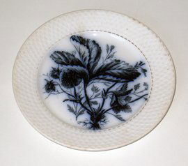 Flow Blue Bread Plate: With a strawberry design and marked "P. Regout & Co. Maastricht Fruit".