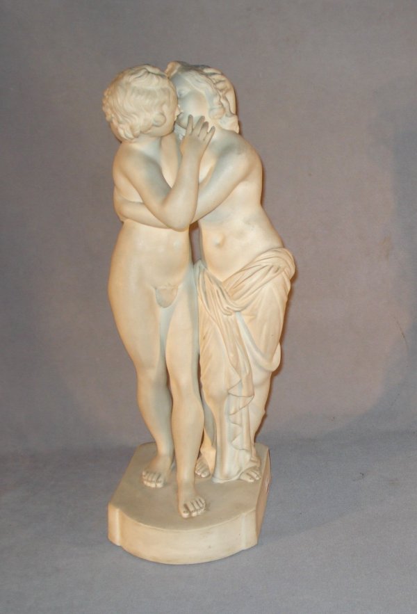 Parian ware statue: A white 18" Parian ware statue of lovers. No signature found. Damage to his arm, as seen in the detail photo.