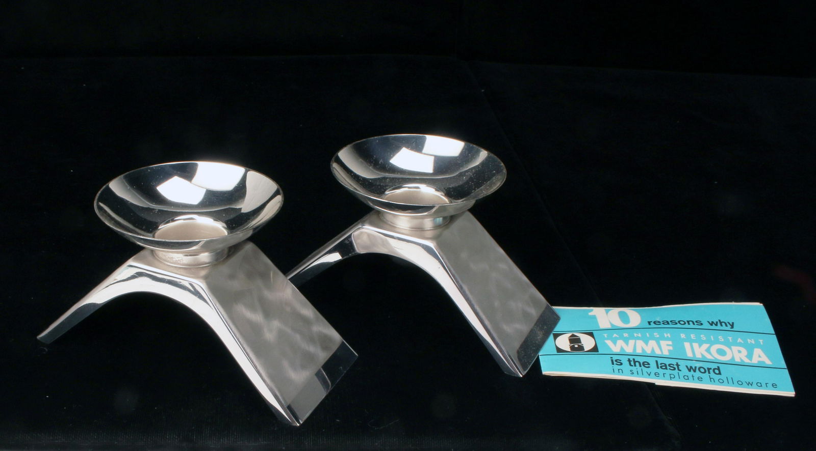 MCM PAIR WMF IKORA SILVERPLATE CANDLEHOLDERS: MCM PAIR WMF IKORA SILVERPLATE CANDLEHOLDERS Entwurf Wilhelm Wagenfeld (1900 Bremen- 1990 Stuttgart), WMF Ikora, 1950er/60er Stamped WFM Ikora Germany