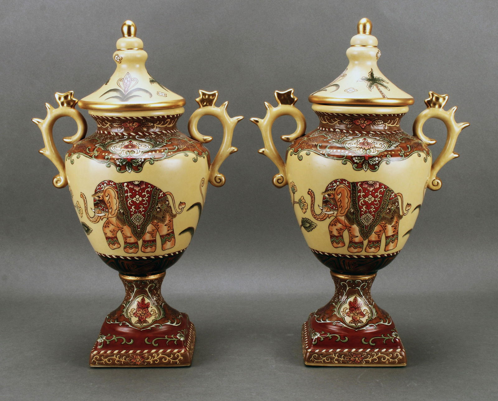 PAIR OF LIDDED ELEPHANT URNS (1 of 6)