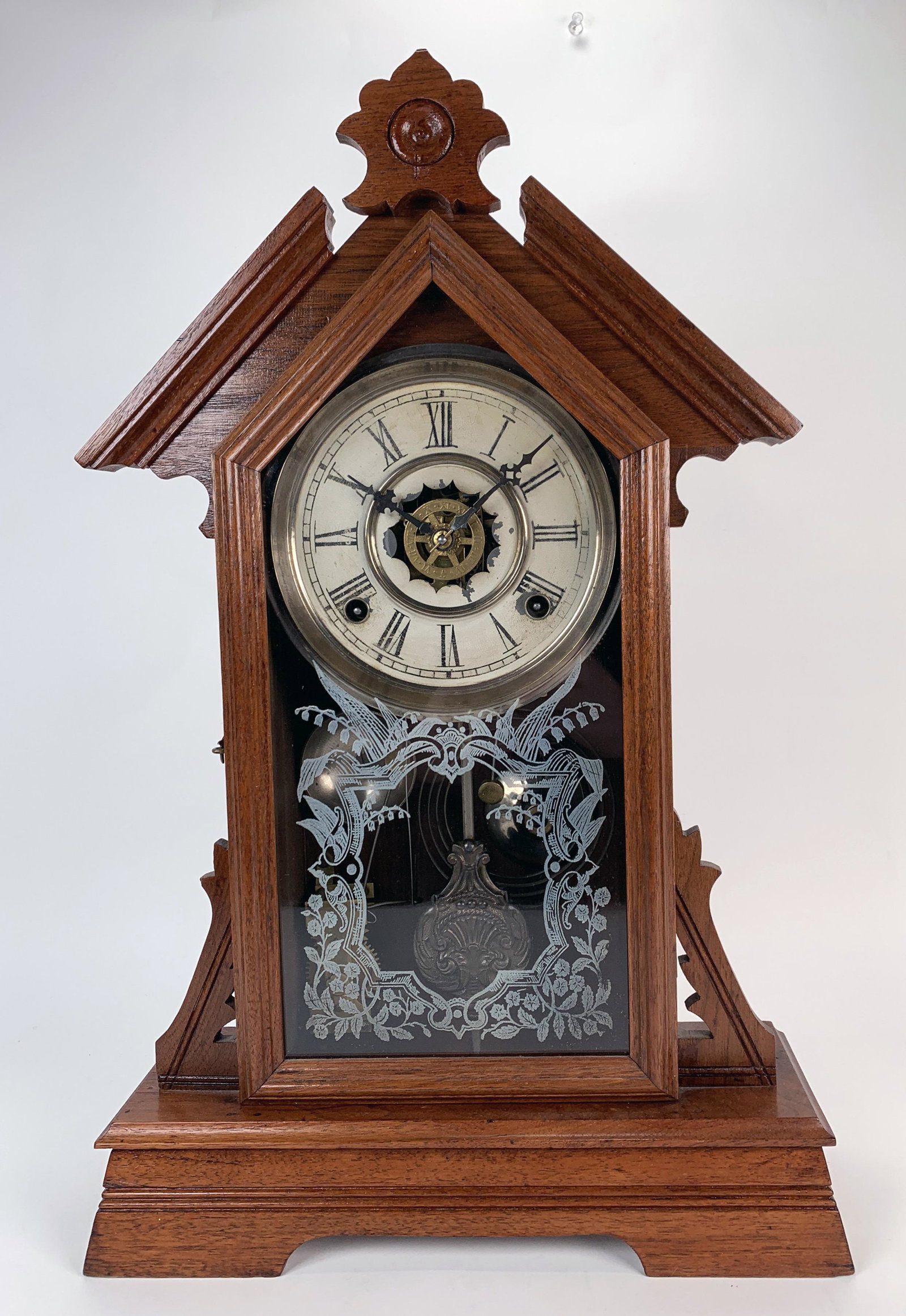 MANTEL PENDULUM CLOCK: MANTEL PENDULUM CLOCK Wooden case, glass door with floral decoration. *untested 20” X 12 1/2” X 4 1/2” Shipp