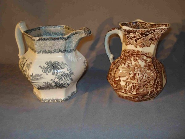 Two Transfer Ware Pitchers: A 19th Century 7" transfer ware pitcher in black and white showing exotic lands and stamped in the bottom: Wedgwood/ Ironstone? Brussels. This is with a 7" "Mason's" "Vista" England Ironstone transfer