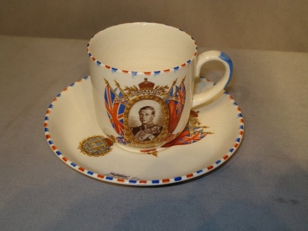 Coronation cup & saucer: Coronet Ware tea cup and saucer with a transfer print in polychrome commemorating Edward VIII.