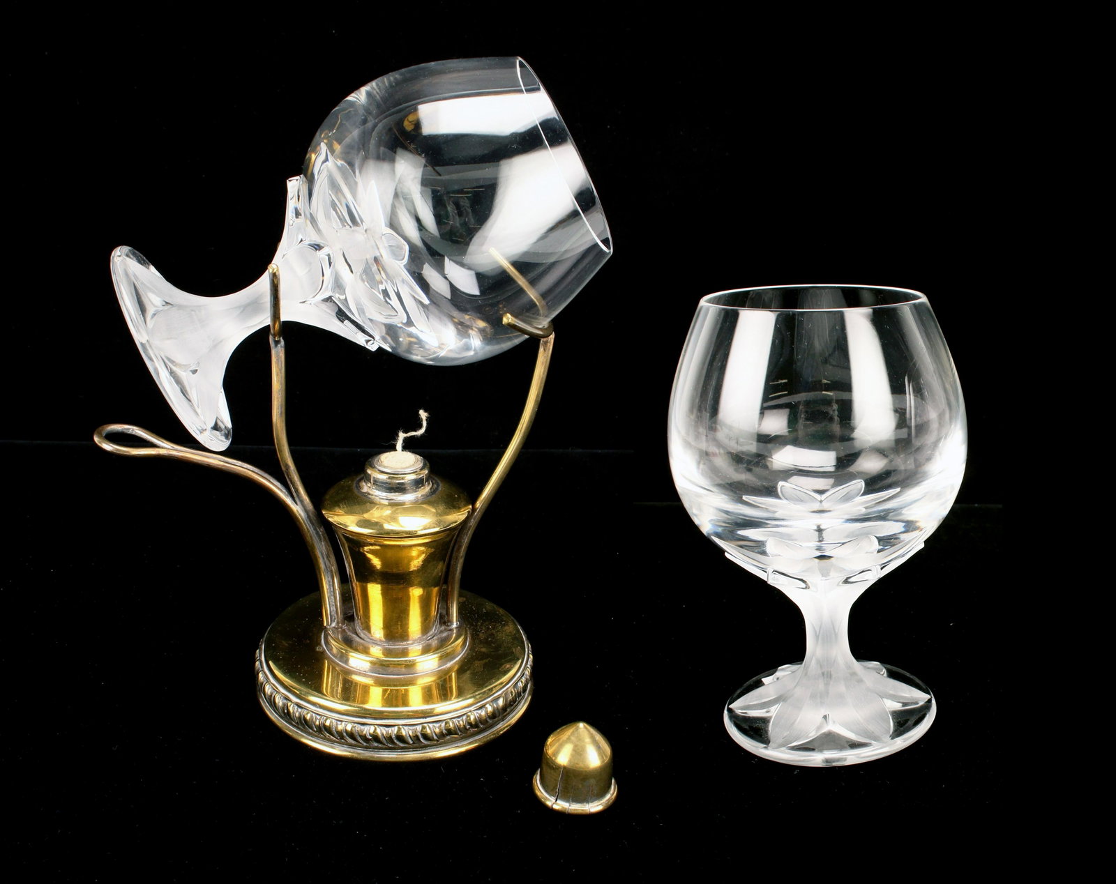 TWO CARTIER CRYSTAL SNIFTERS & SNIFTER WARMER: TWO CARTIER CRYSTAL SNIFTERS & SNIFTER WARMER Crystal snifters with frosted flower stem marked Cartier on bottom. Snifter warmer marked Made in Italy.