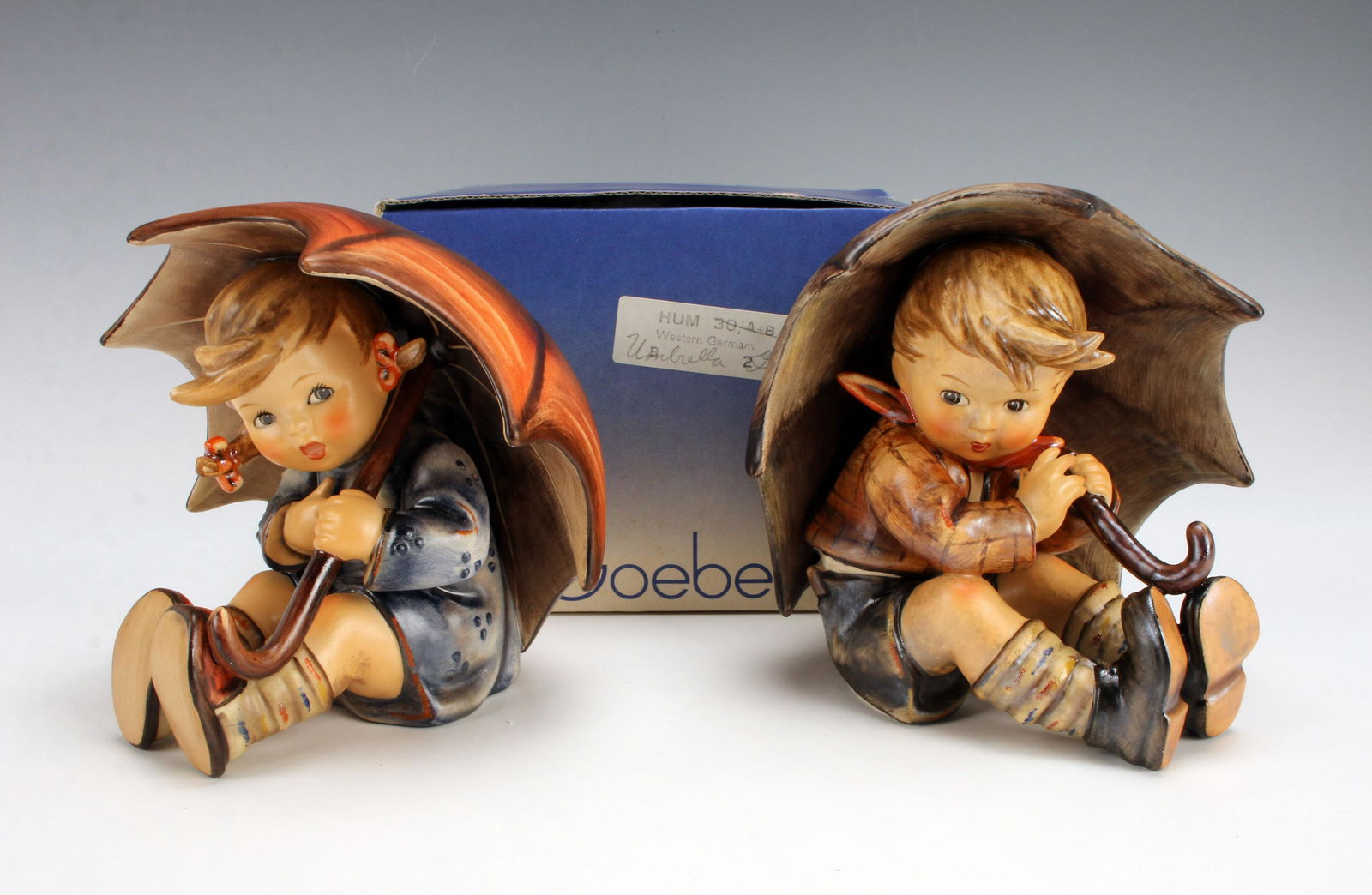HUMMEL LARGE UMBRELLA BOY AND GIRL FIGURINES (1 of 8)