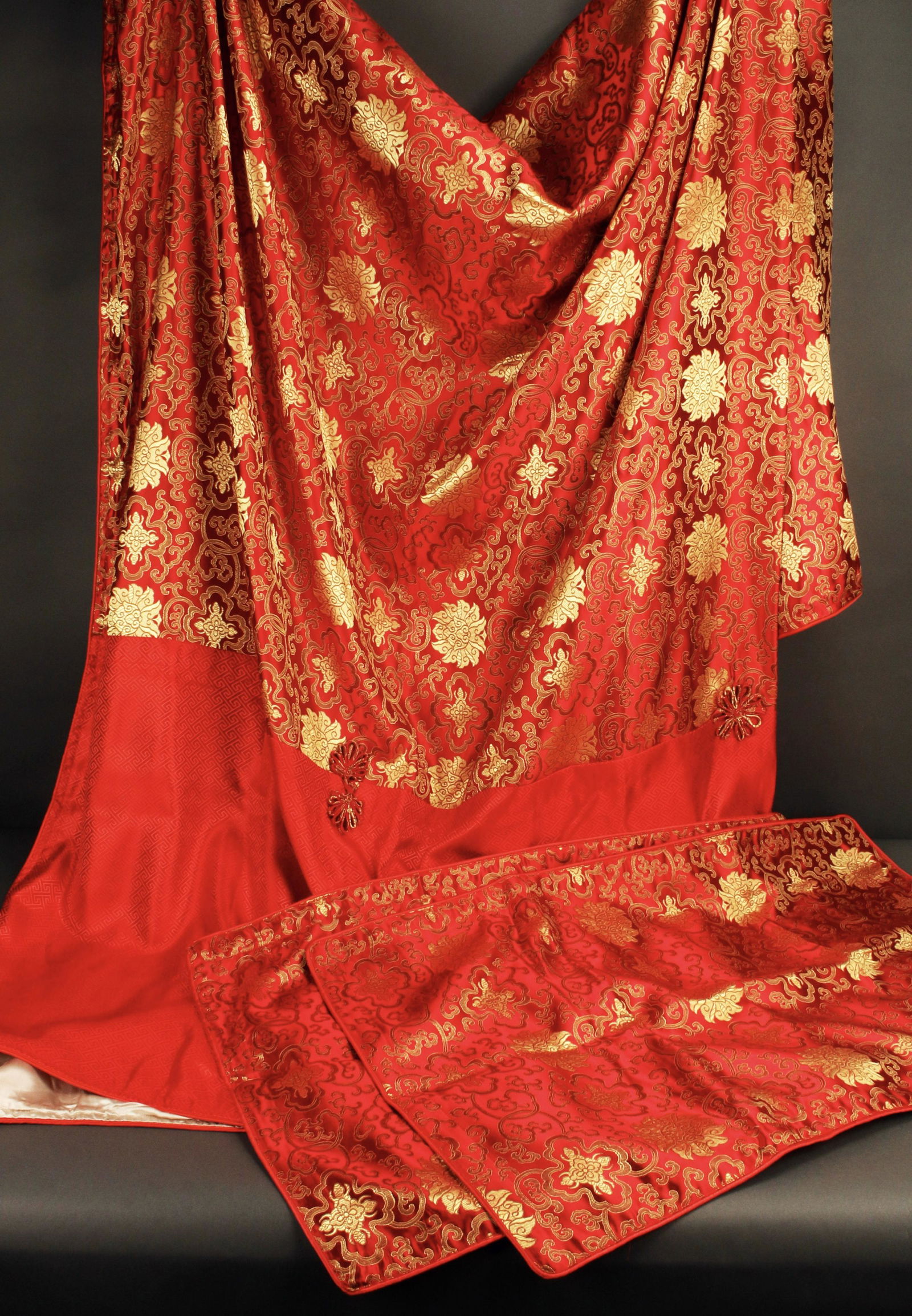 RED AND GOLD CHINESE DUVET COVER & KING SHAMS: RED AND GOLD CHINESE DUVET COVER & KING SHAMS Duvet cover in red with gold lotus and cloud designs with button closure, with two matching king size pillow shams. Will fit an extra la