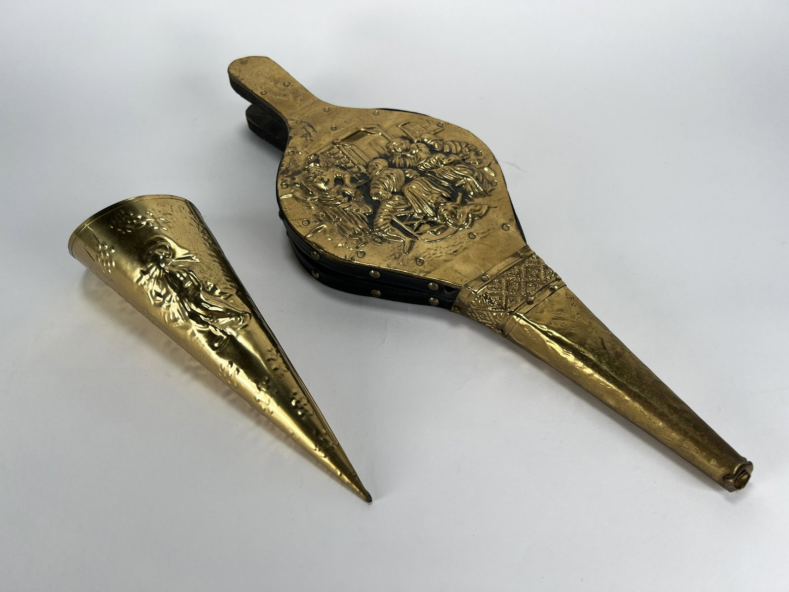 FIREPLACE BELLOW & MATCHSTICK HOLDER: FIREPLACE BELLOW & MATCHSTICK HOLDER With embossed pub scene on the bellow, and a man with sack over his shoulder on the matchstick holder. 18"