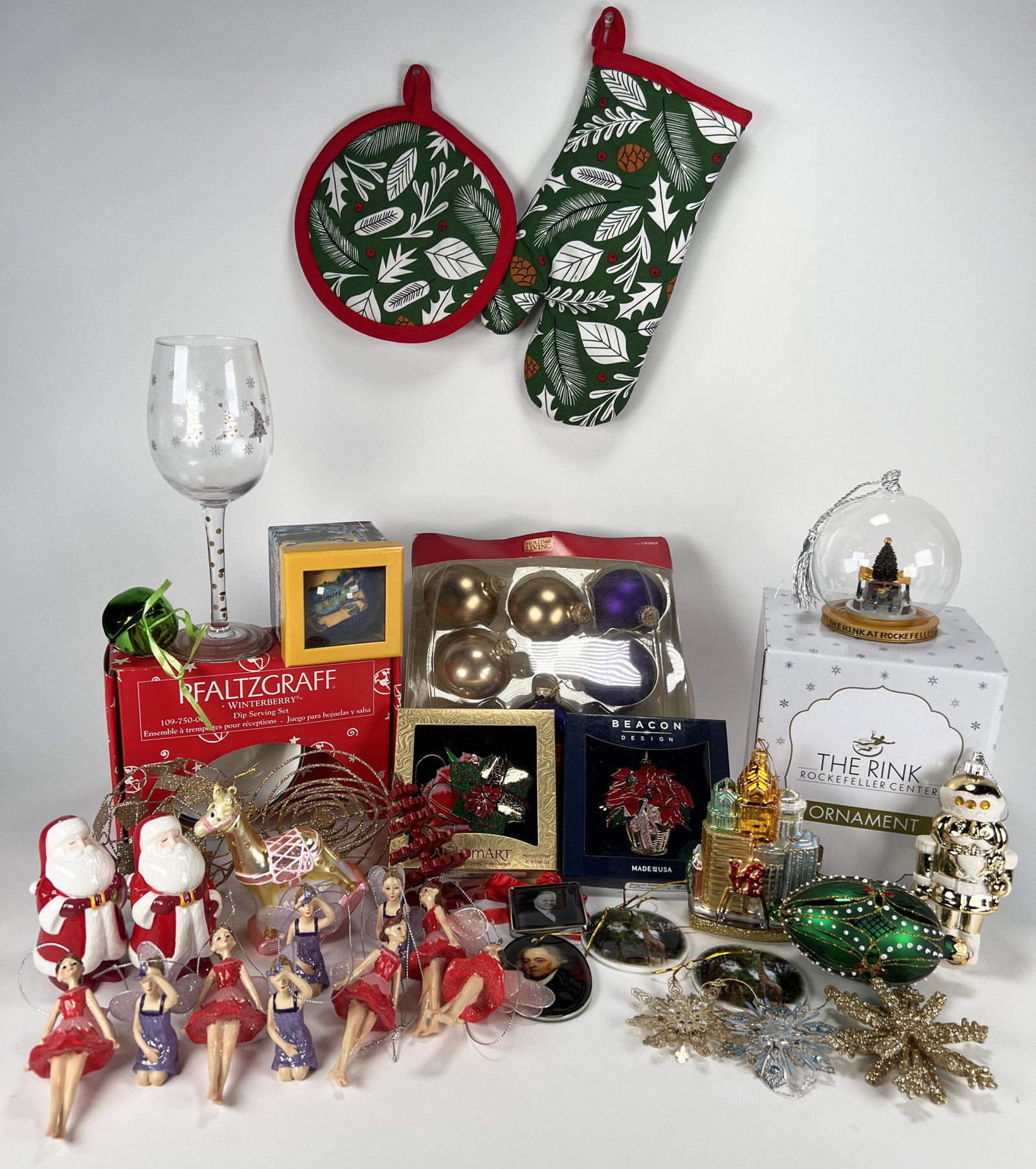 LARGE LOT OF CHRISTMAS ORNAMENTS & DECORATIONS: LARGE LOT OF CHRISTMAS ORNAMENTS & DECORATIONS Kick off your season with some new decorations! Including ornaments, wine glass, pot holders, Santa salt and pepper shakers, snow globe