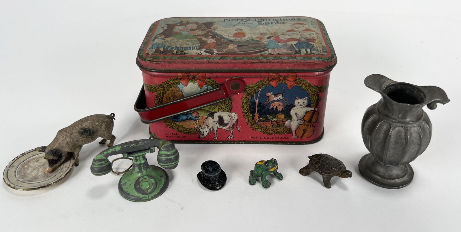 SMALL TIN COLLECTIBLE FIGURES IN CHRISTMAS TIN (1 of 8)