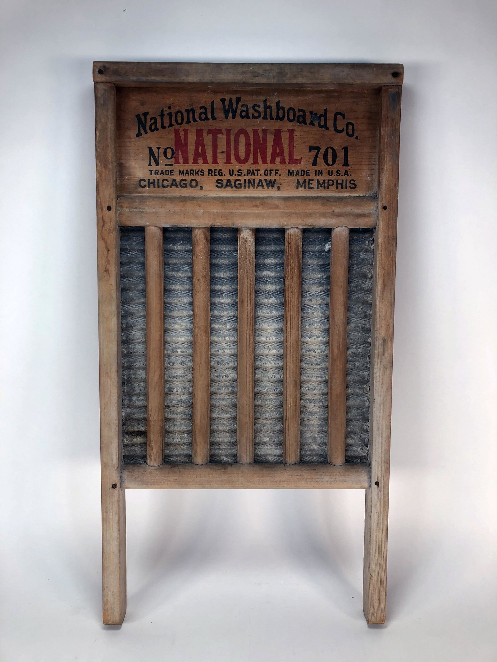 NATIONAL WASHBOARD CO # 701 WASHBOARD: NATIONAL WASHBOARD CO # 701 WASHBOARD Wood frame washboard with metal herringbone rubbing surface. Can be played as a musical instrument. 12" X 24