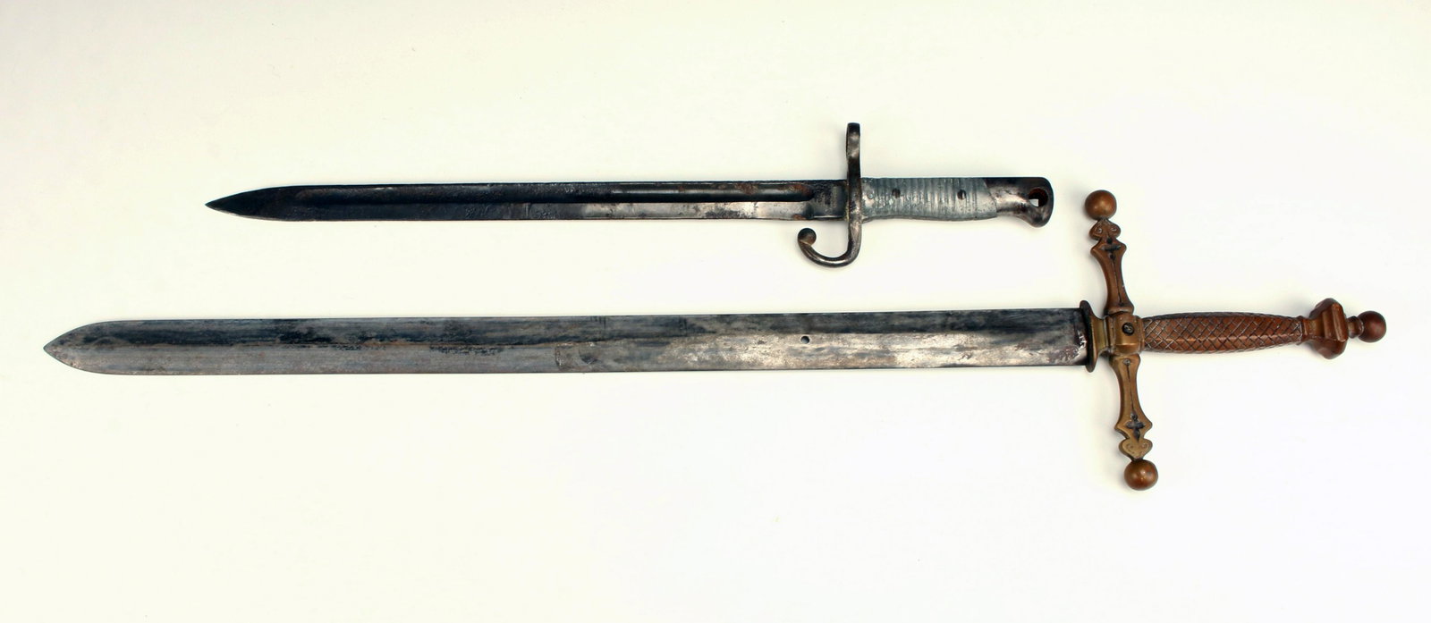 GERMAN ARGENTINE MAUSER BAYONET AND SWORD: GERMAN ARGENTINE MAUSER BAYONET AND SWORD German manufactured Argentine Mauser model 1891 bayonet with aluminum grips, marked Weyersberg Kirchbaum & Co Solingen and Modelo Argentino