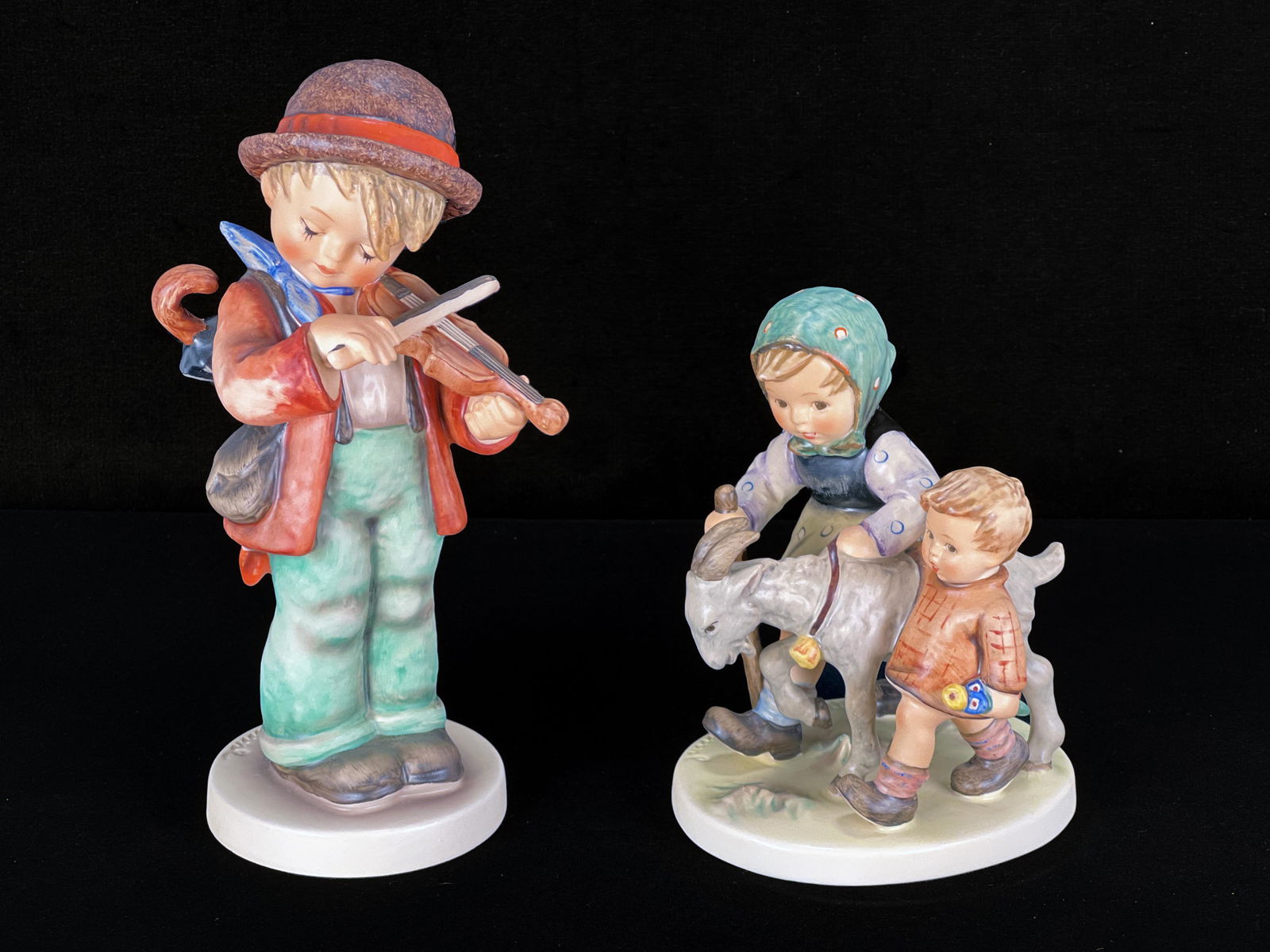 TWO GOEBEL HUMMELS LARGE LITTLE FIDDLER TMK-6: TWO GOEBEL HUMMELS LARGE LITTLE FIDDLER TMK-6 Large 8 1/2" Little Fiddler and Homeward Bound. Both artist signed. 8 1/2" Shi