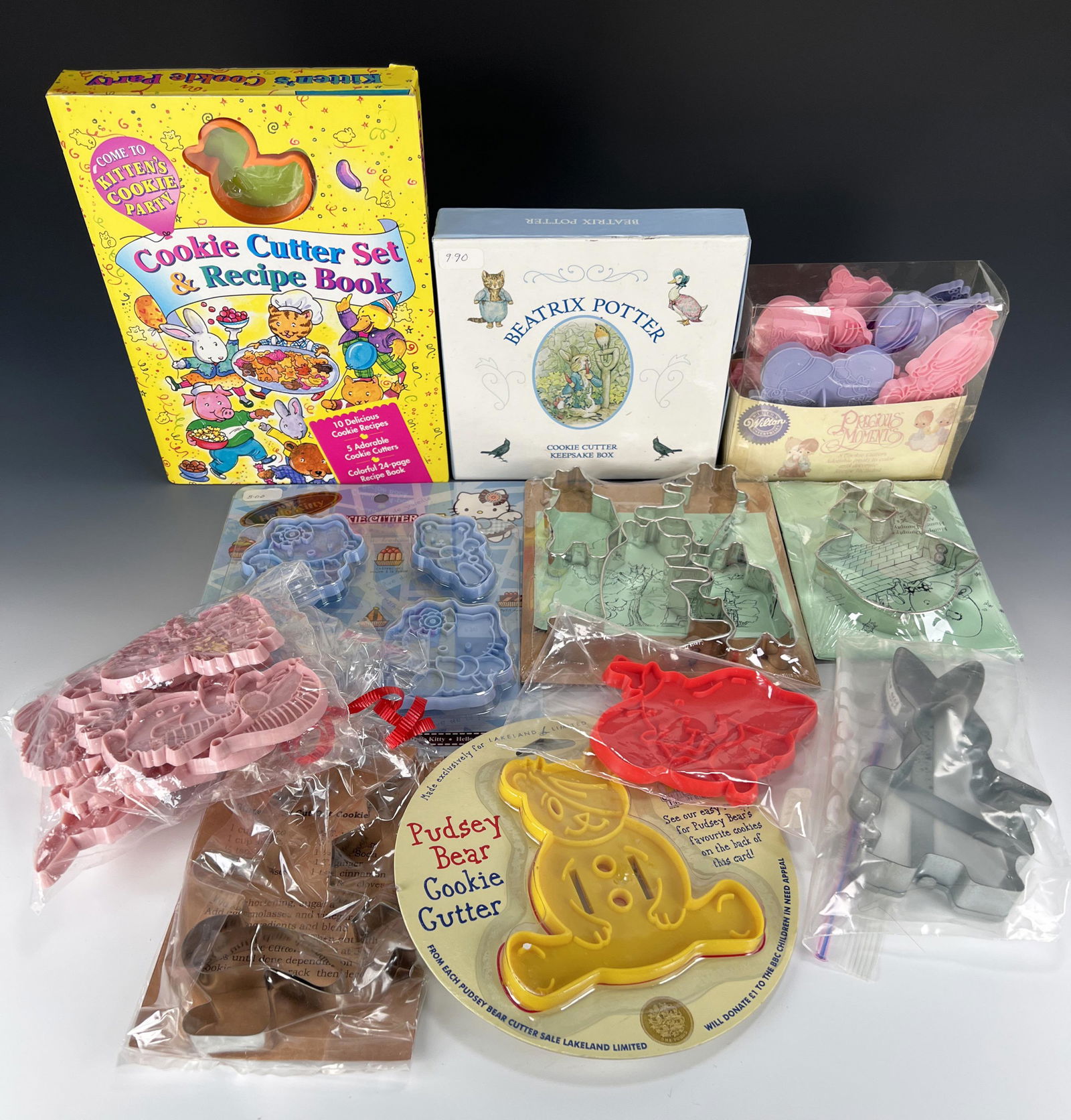 PRECIOUS MOMENTS HELLO KITTY BEATRIX POTTER COOKIE: PRECIOUS MOMENTS HELLO KITTY BEATRIX POTTER COOKIE CUTTERS Fun cookie cutters for the kids! Make Precious Moments, Hello Kitty, and Beatrix Potter themed cookies for your next party.