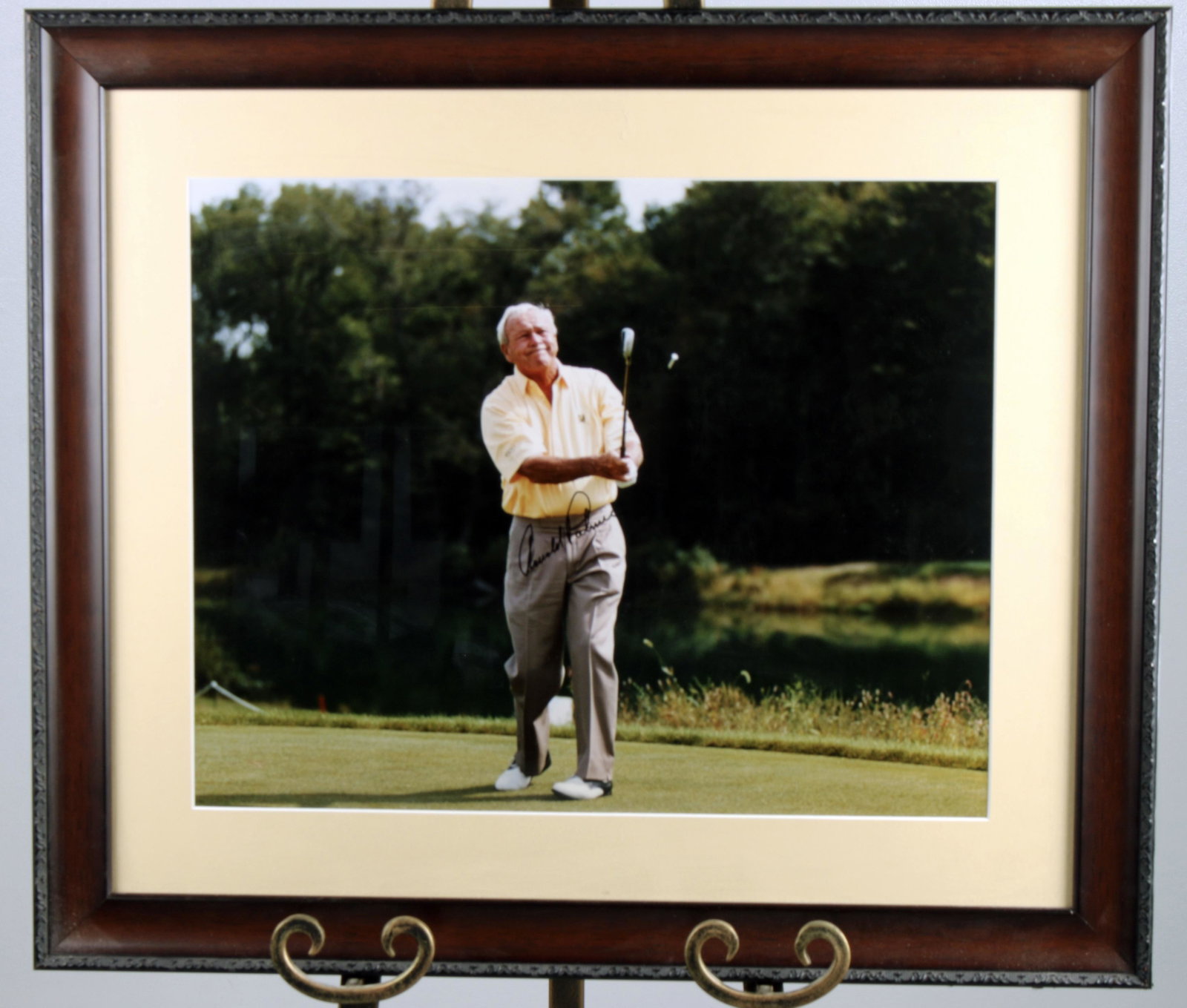 SIGNED PHOTO OF ARNOLD PALMER: SIGNED PHOTO OF ARNOLD PALMER The blue collar mans golfer. It's never to late to join Arnie's Army by buying autographed photo. Converse Auctions does not authenticate